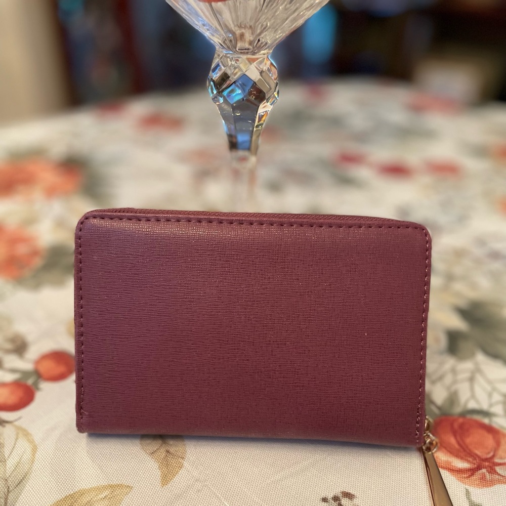 Woman's Mauve wristlet wallet